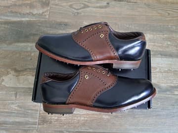 FootJoy style 51243: Smooth Black/Pebbled Brown saddle